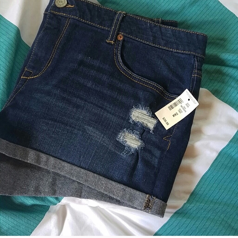 Distressed denim shorts
